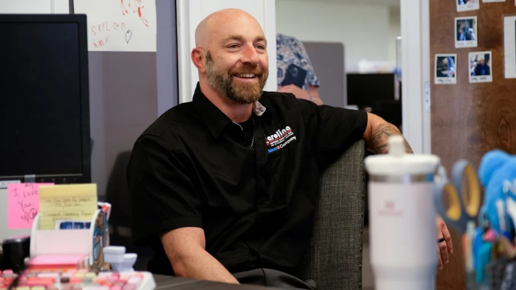 CHS technician at office smiling
