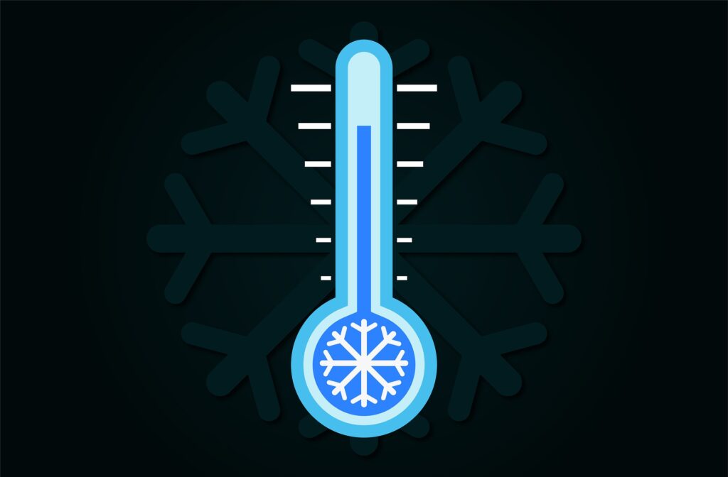 Stylized blue thermometer with a snowflake at the bulb, set against a dark teal snowflake background to convey cold temperature.